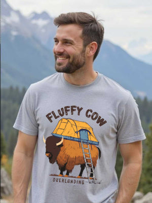 fluffy cow overlanding man